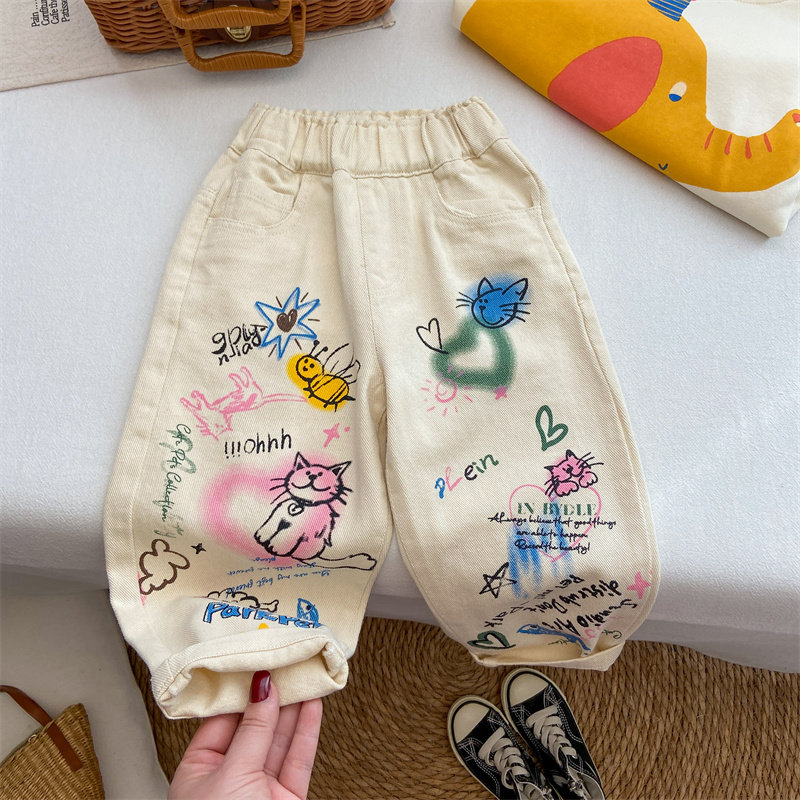 女童裤子春秋款2026新款宝宝洋气时髦米白色牛仔裤宽松涂鸦休闲裤