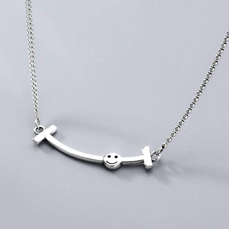 新款 韩版简约不对称链子可爱微笑女时尚气质个性双t笑脸锁骨项链