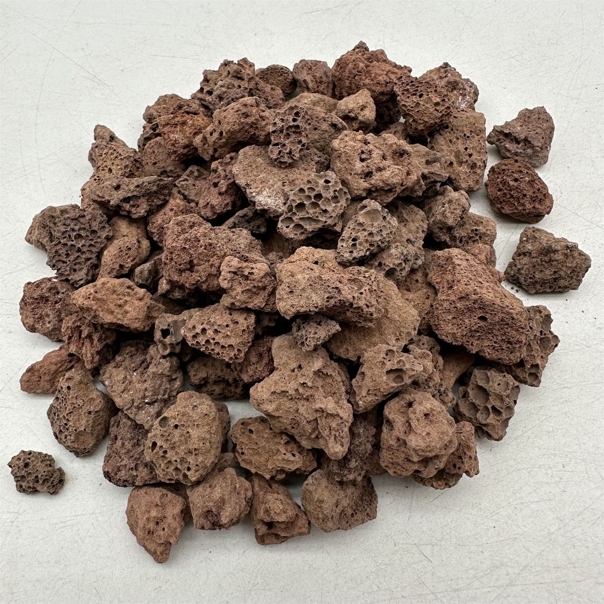 热销厂家批发污水处理火山石红色滤料鱼缸底砂造景园艺栽培火山岩