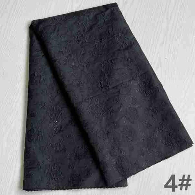 新款时尚大提花色织立体织金服装面料高精密工厂