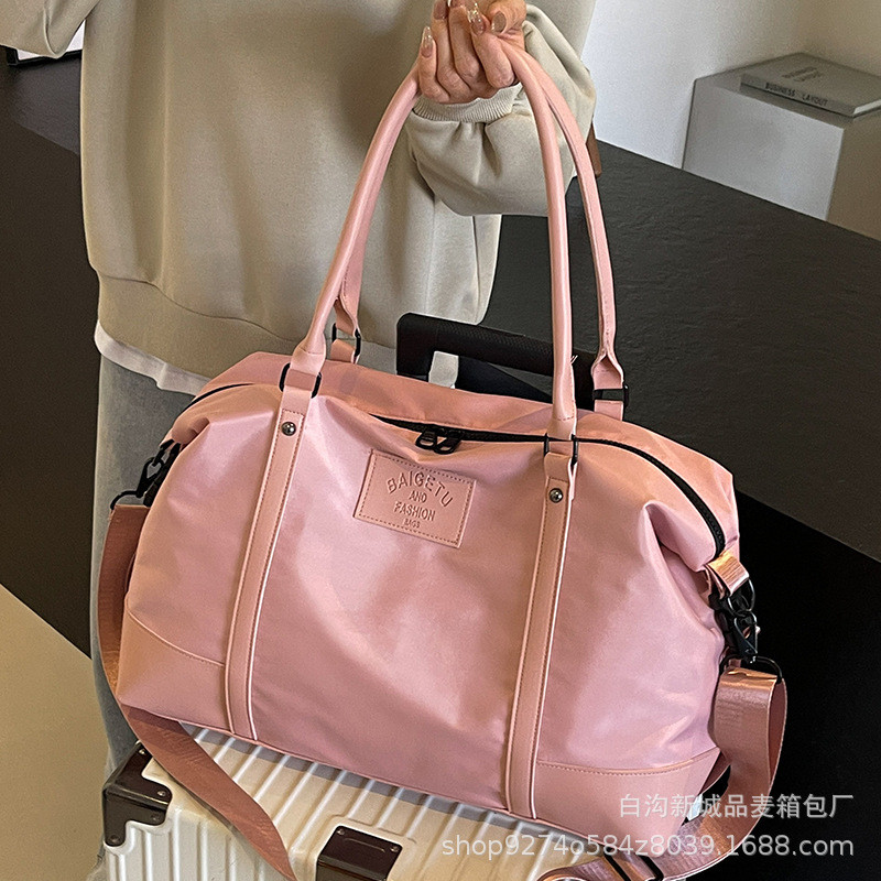 爆款手提大包包女2025新款潮短途旅行单肩包大容量通勤斜挎托特包