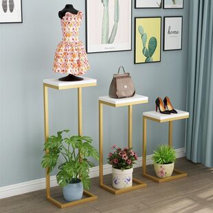 服装店橱窗展示置物高低鞋包花流水台中岛简约陈列落地柜货架子