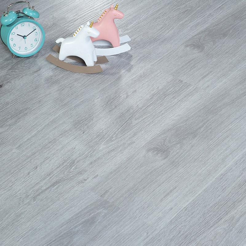 定制批发石塑地板4mm家用商用卧室客厅通铺防水石隔热晶石塑地板