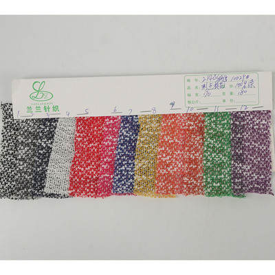 现货针织竹节色织双色提花布全涤大肚纱休闲服提花180克单面装运