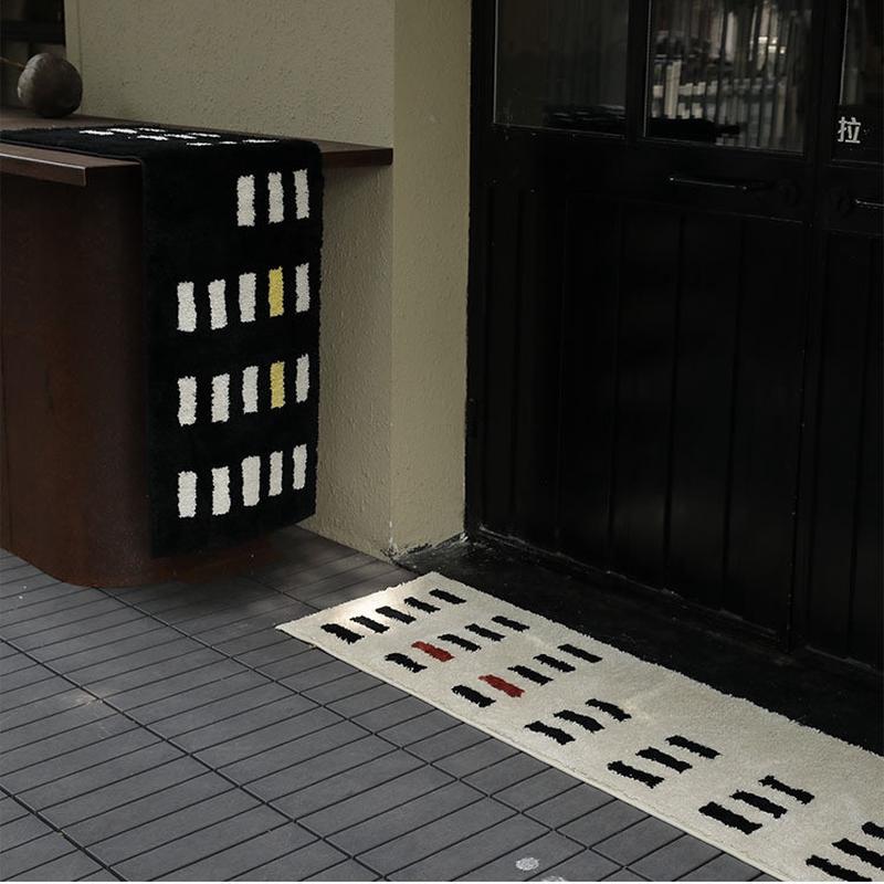 ins黑白植绒地毯簇绒家用卧室床边地垫毯防滑吸水简约地毯房间