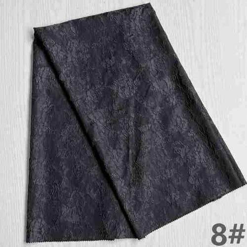 新款色织梭织大提花服装面料单色高精密提花时尚工厂