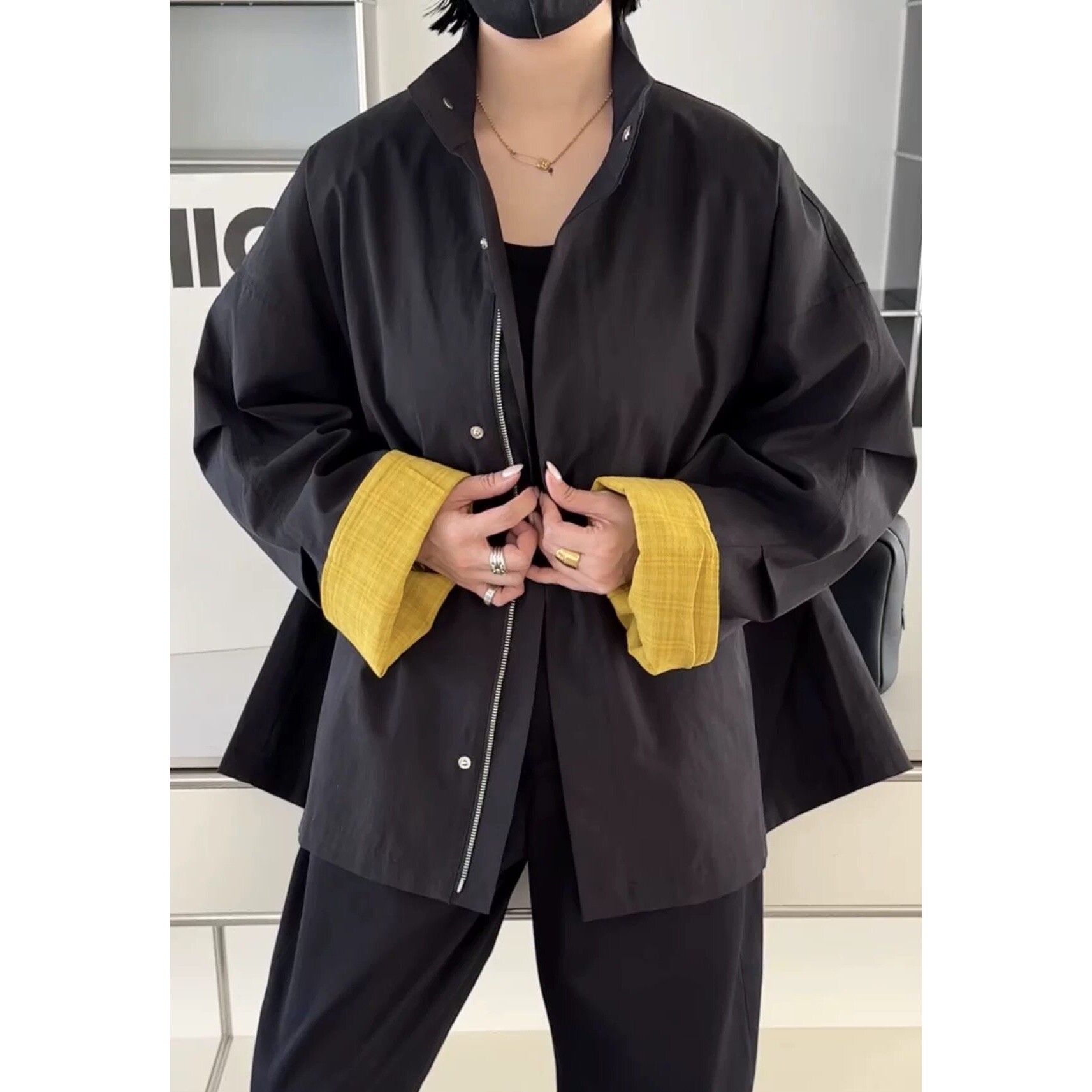 诗歌兰女装2026春款 266020优雅休闲时髦简约拼色翻边袖风衣外套