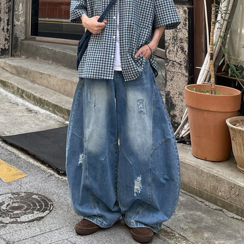 韩国代购男装破洞弯刀拉丝牛仔裤