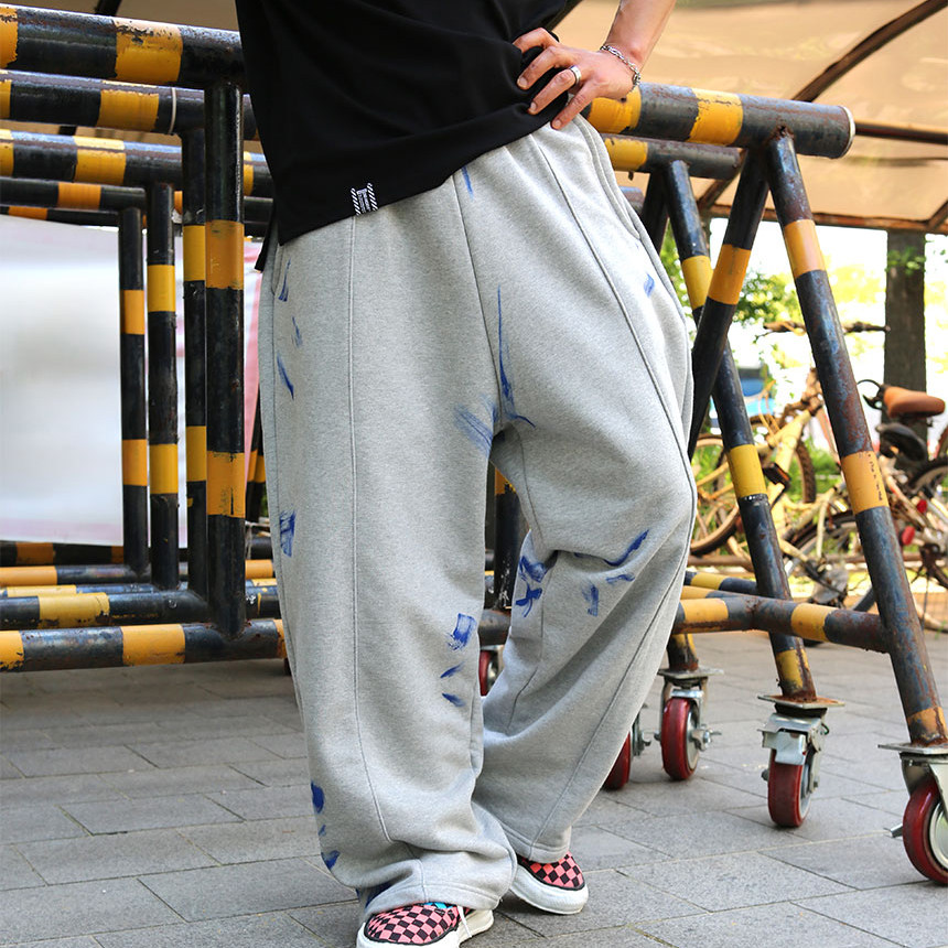 韩国东大门代购街头个性涂鸦拼接泼墨嘻哈可束脚运动休闲卫裤男