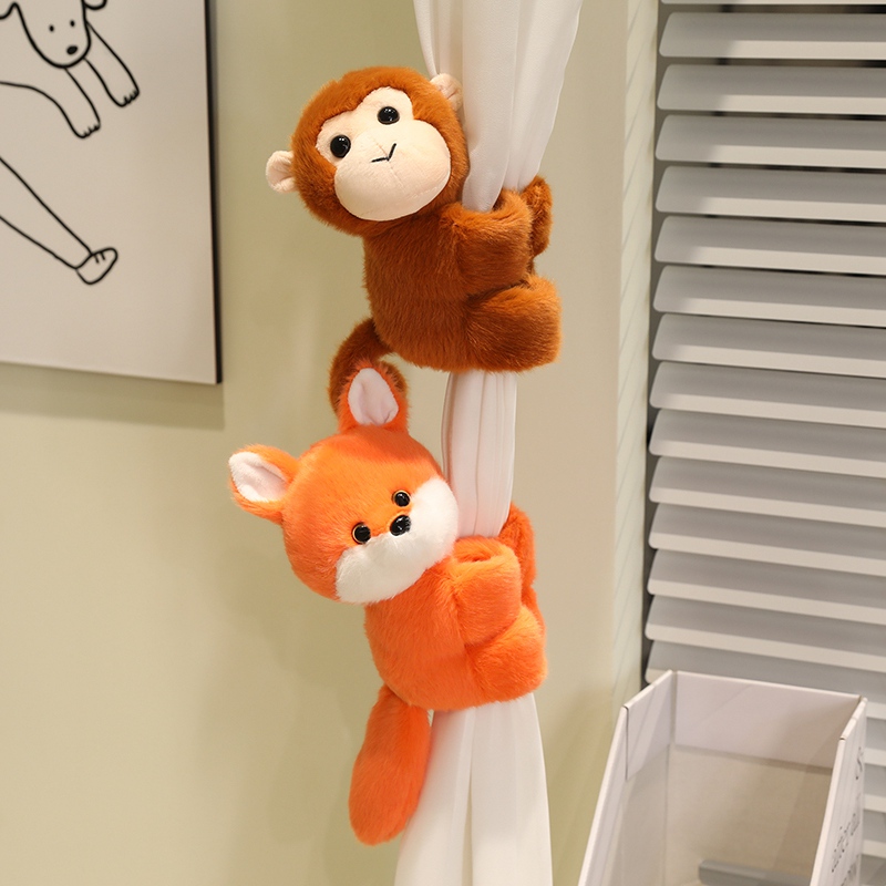 小浣熊猴子啪啪圈毛绒玩具