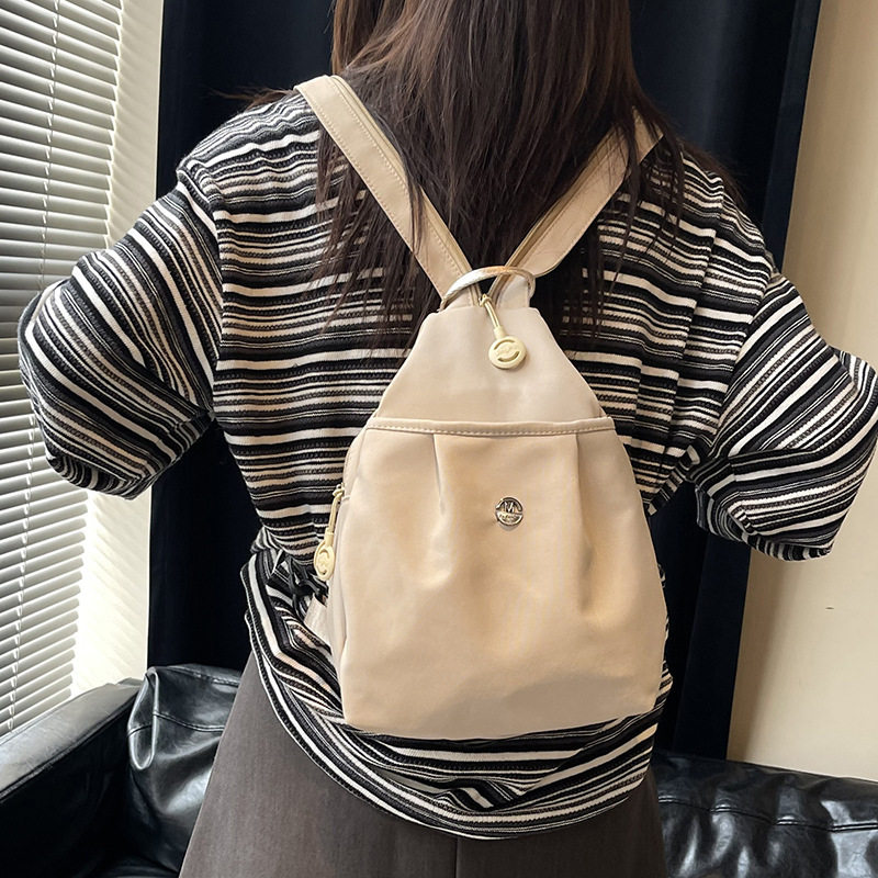 迷你双肩包女2026新款简约百搭防盗时尚日常通勤旅行轻便外出背包