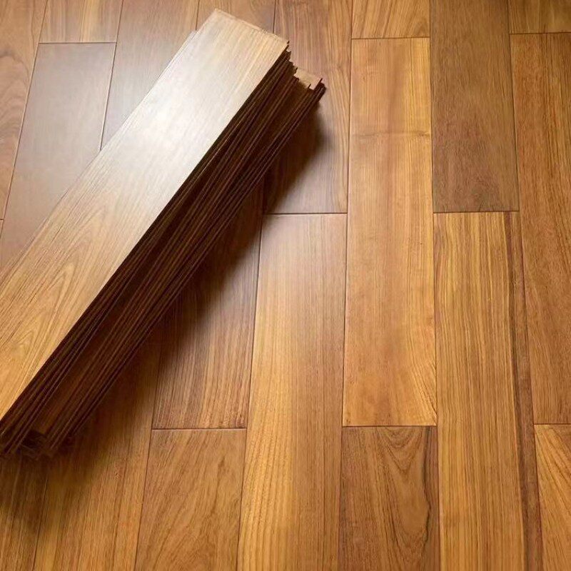 缅甸柚木国宝木材瓦城a料 纯实木地板家用原木人字鱼骨拼锁扣地暖