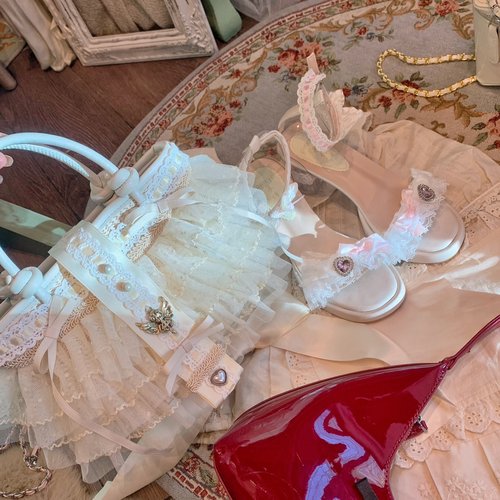 原创蕾丝缎带蝴蝶结度假风草编包