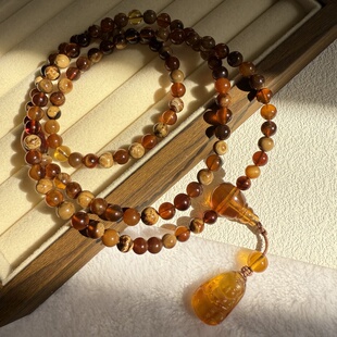 天然琥珀蜜蜡手串手多层链根珀妖花金珀108颗多宝项链6mm 18克 女