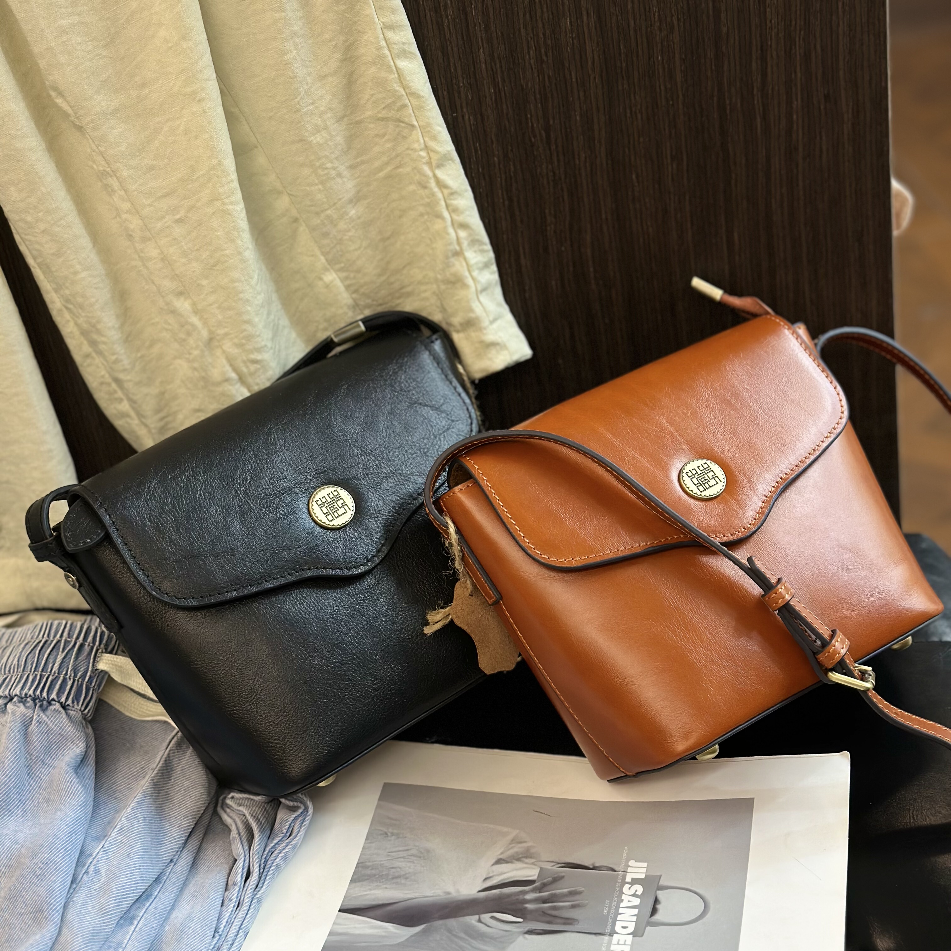 藏皮客包包女式2025冬新款头层牛皮单肩斜挎包真皮简约翻盖水桶包
