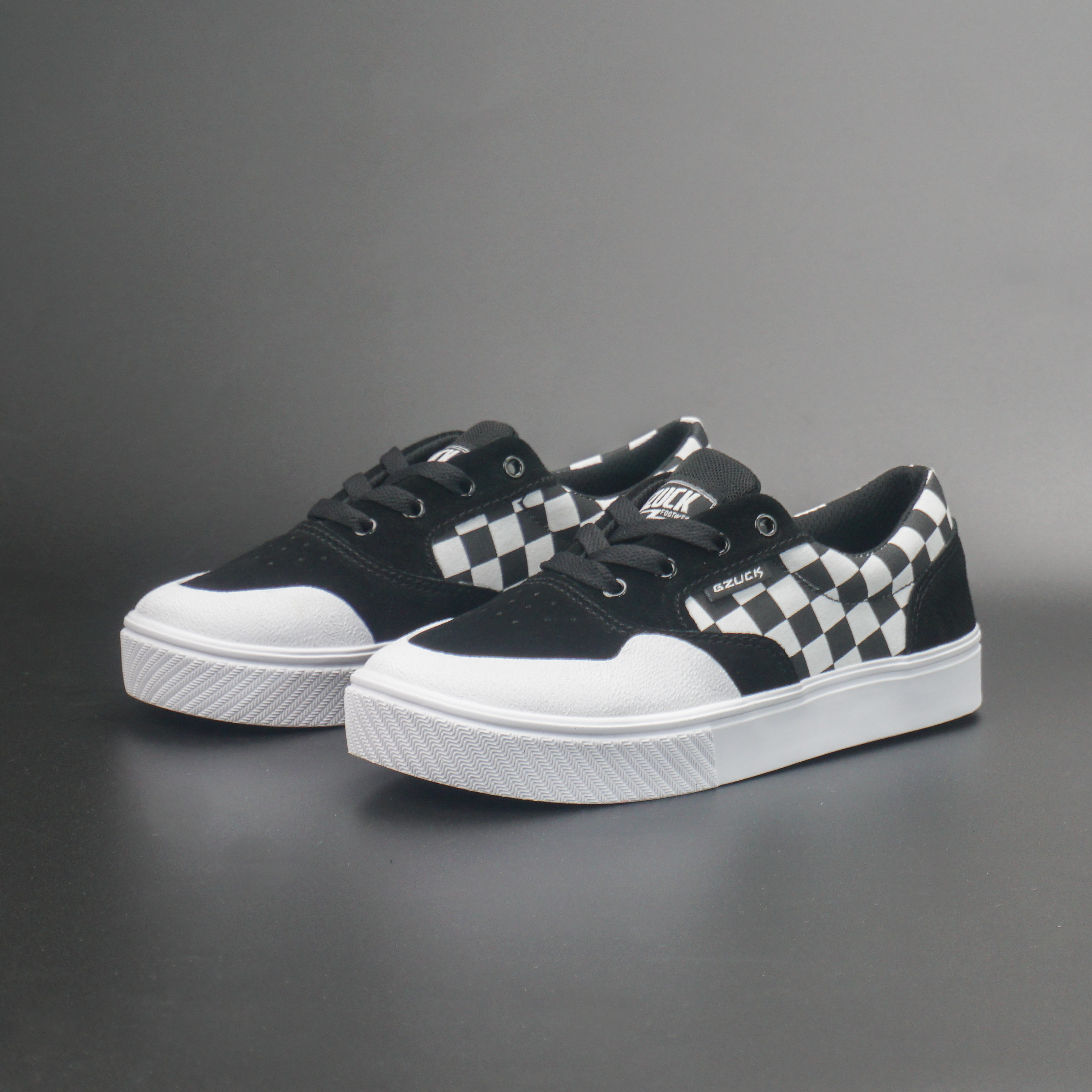 几朱可爆米花底减震耐磨包头翻毛皮专业滑板鞋男女黑白格棋盘