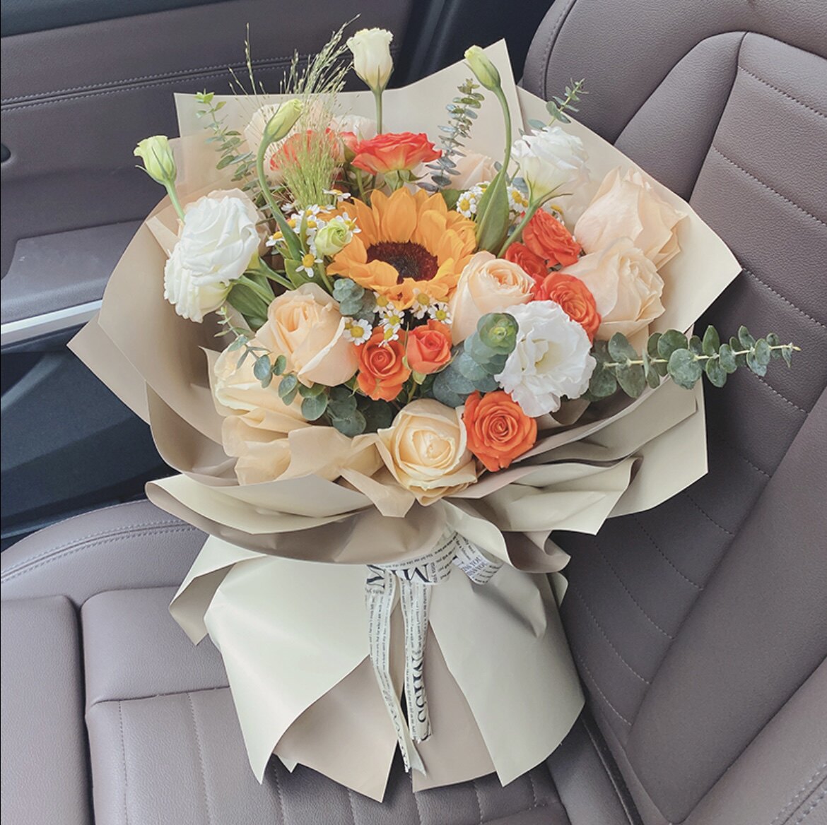 昆明花店昆明鲜花速递 香槟玫瑰 向日葵混搭花束