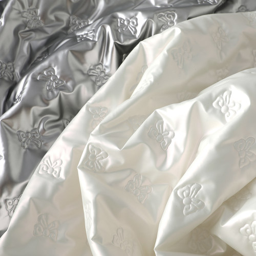 ins可爱蝴蝶结夹棉羽绒服布料内胆棉服马甲服装防水面料白色银色