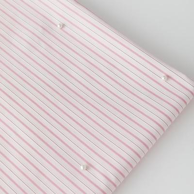 粉色条纹钉珠涤棉服装童装布料
