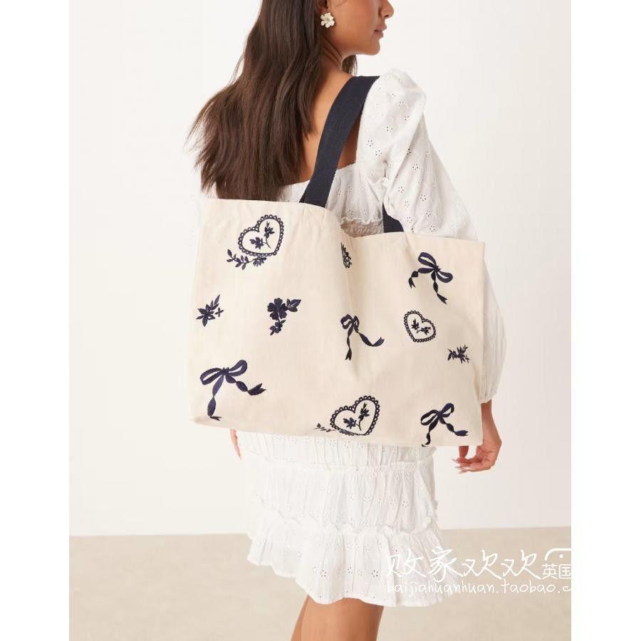 英国代购正品08.12 2025潮流导向 女包新款 蝴蝶结图案帆布托特包