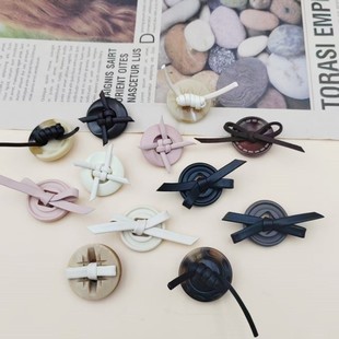 pu皮蝴蝶结树脂纽扣绳结女大衣风衣羊羔毛羽绒服外套服饰装饰扣子