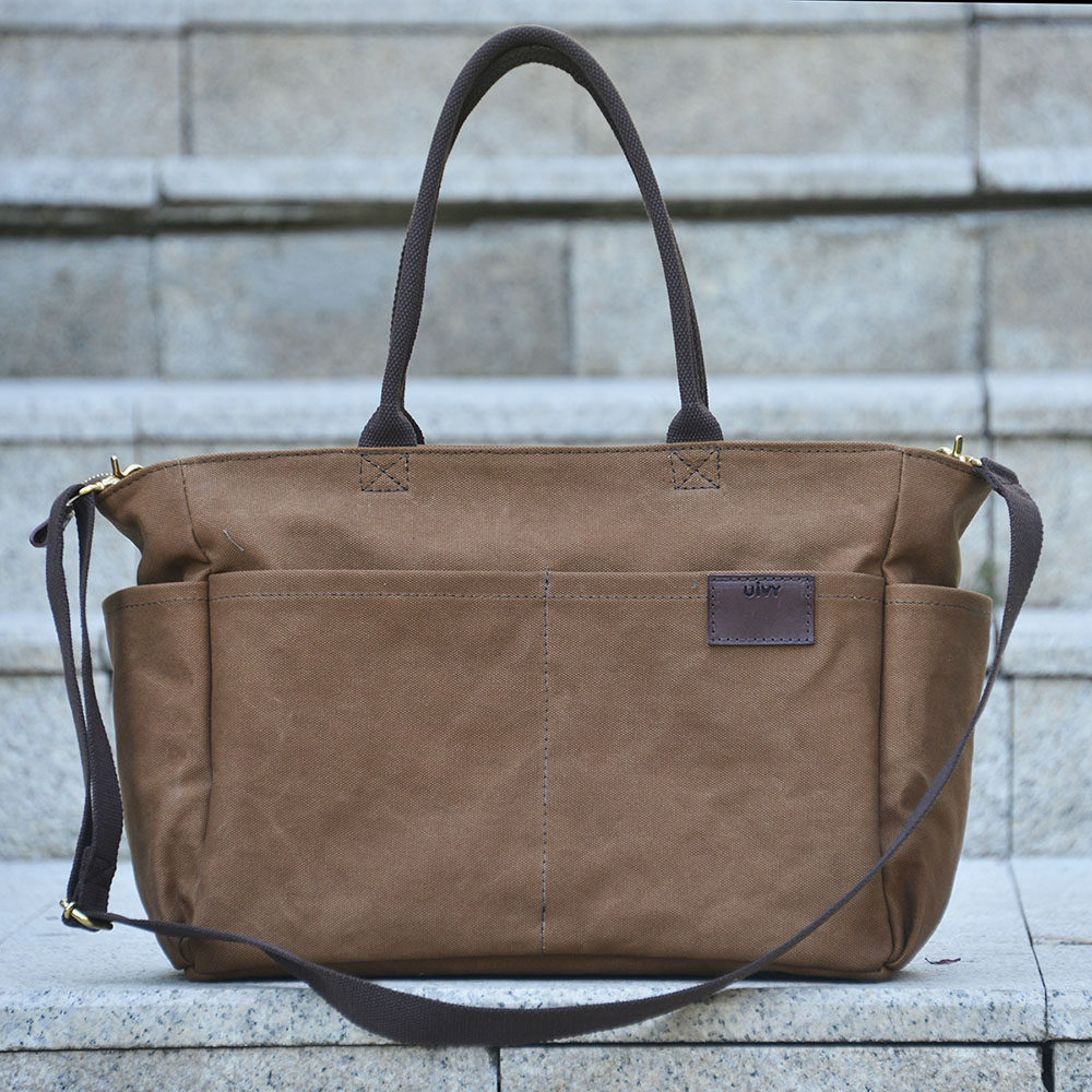 斜挎单肩手提重磅厚包焦糖色旅行