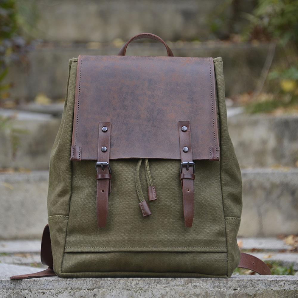 双肩包旅行背包军绿重磅厚帆布配植鞣皮树膏牛皮中性无性别风uivy