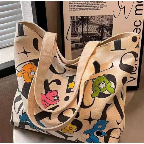 学生帆布包女大容量托特通勤包百搭印花妈咪包手提单肩包购物袋女