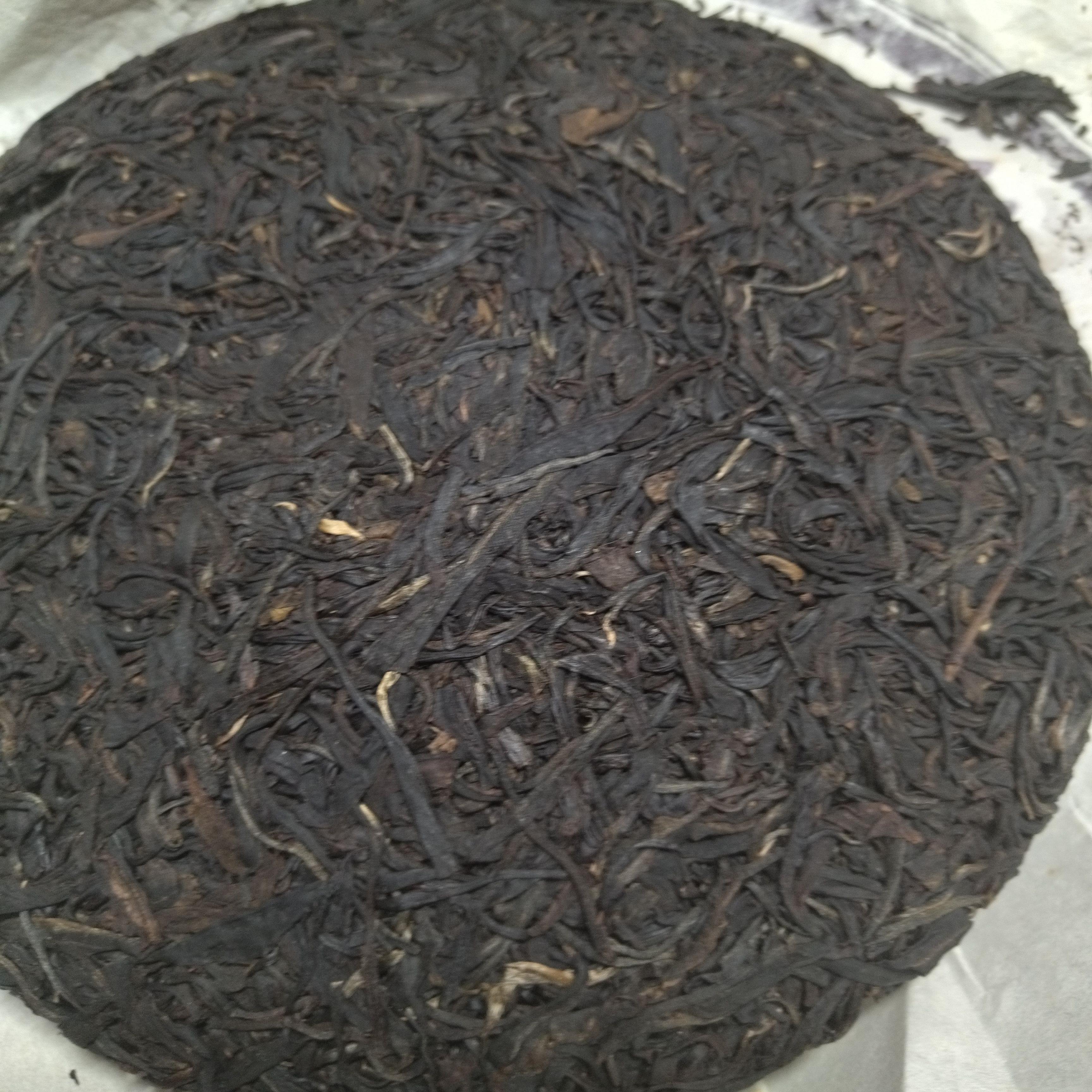2012头春布朗山古树紫芽茶357克普洱生茶饼