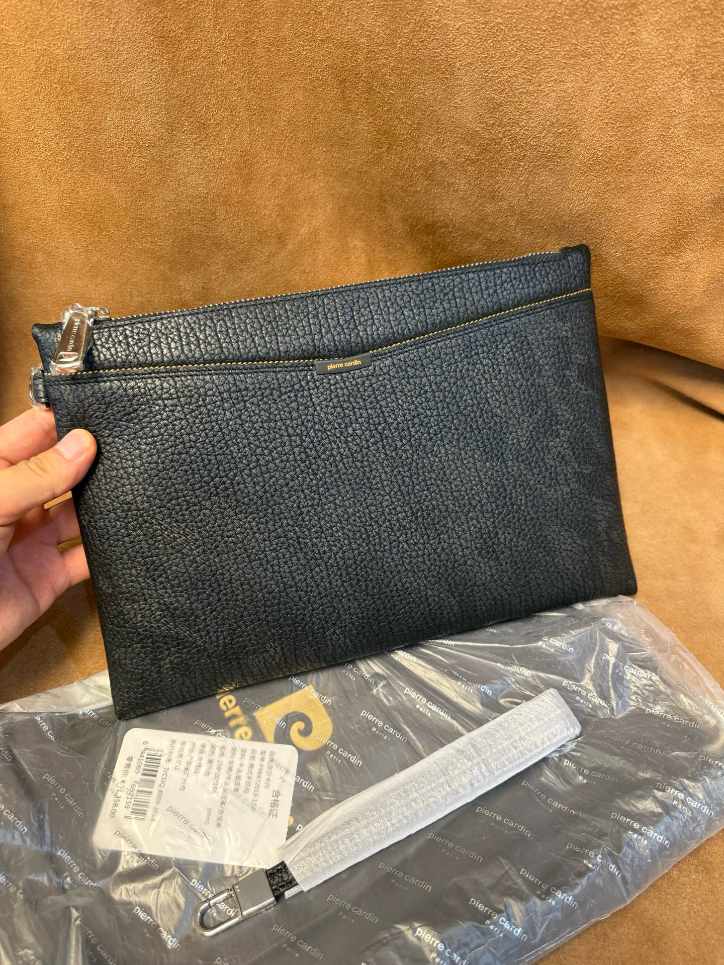撤柜高端品牌皮卡男士信封包手拿包进口头层牛皮手感特别舒适