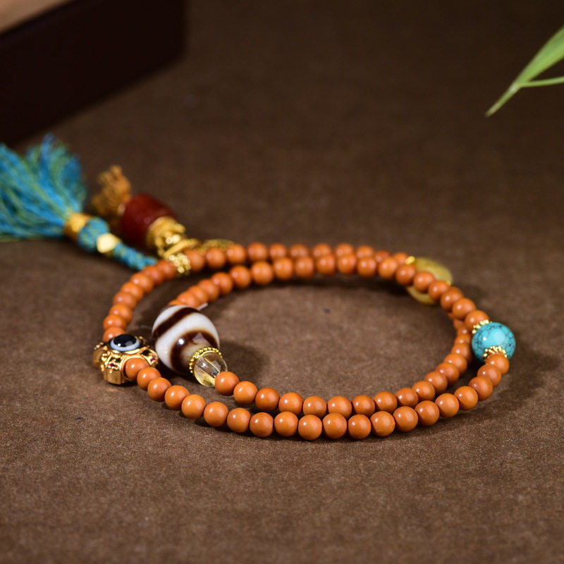 原创新款橄榄核文玩手链虎牙天珠多宝手串藏式流苏小挂件直播供货