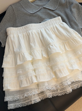 洋气甜辣白色半身裙女夏季减龄高腰A字蕾丝花边拼接蓬蓬蛋糕短裙
