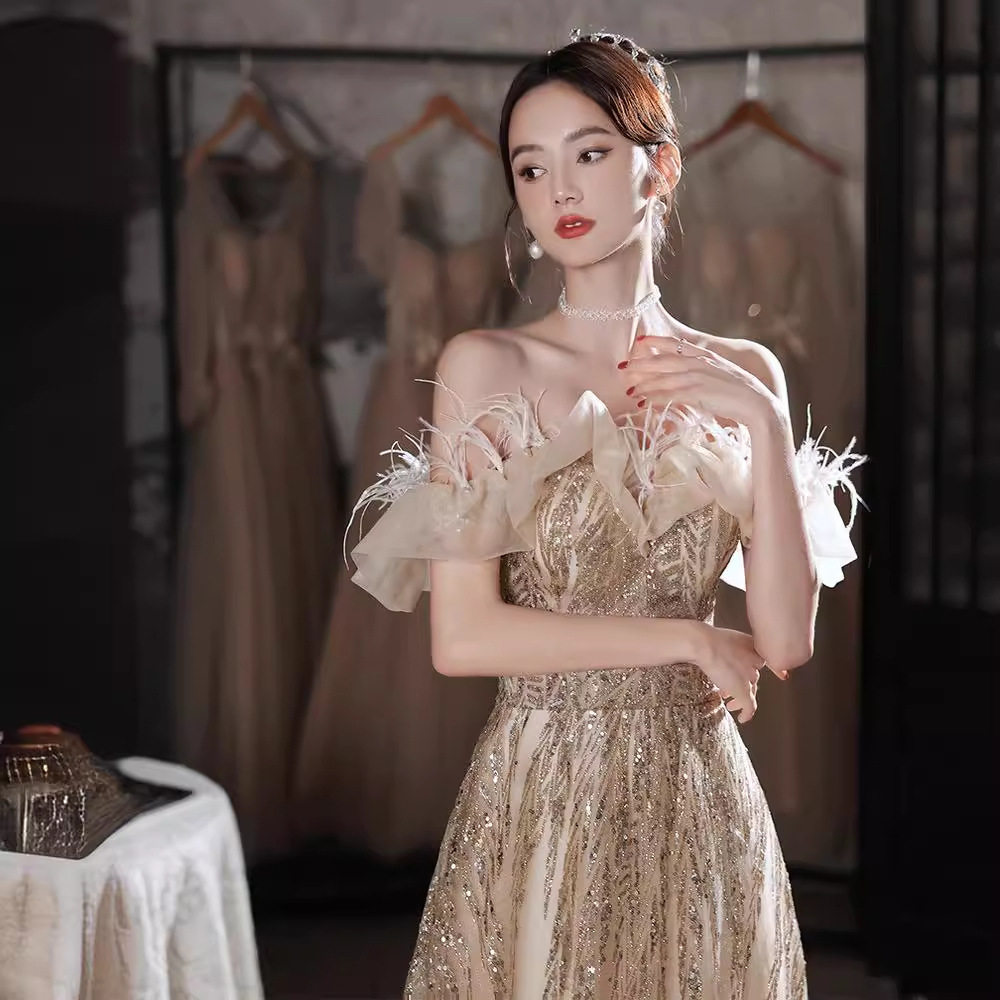 晚礼服女2026新款高级感宴会演出生日香槟色轻奢小众主持人连衣裙