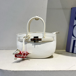 劳拉时黛时尚荔枝纹半圆手提凯莉包女包2026新款高级感百搭斜挎包