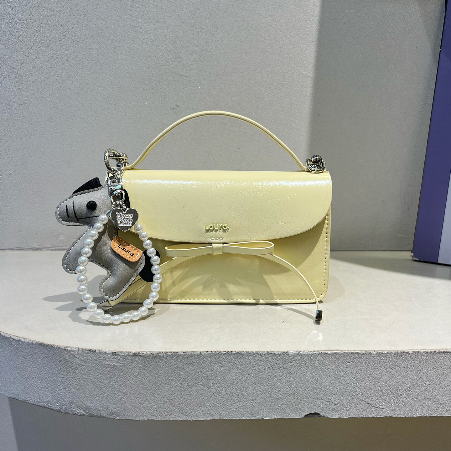 劳拉时黛韩版甜美蝴蝶结小方包糖果色斜挎包女2026春夏新款手提包