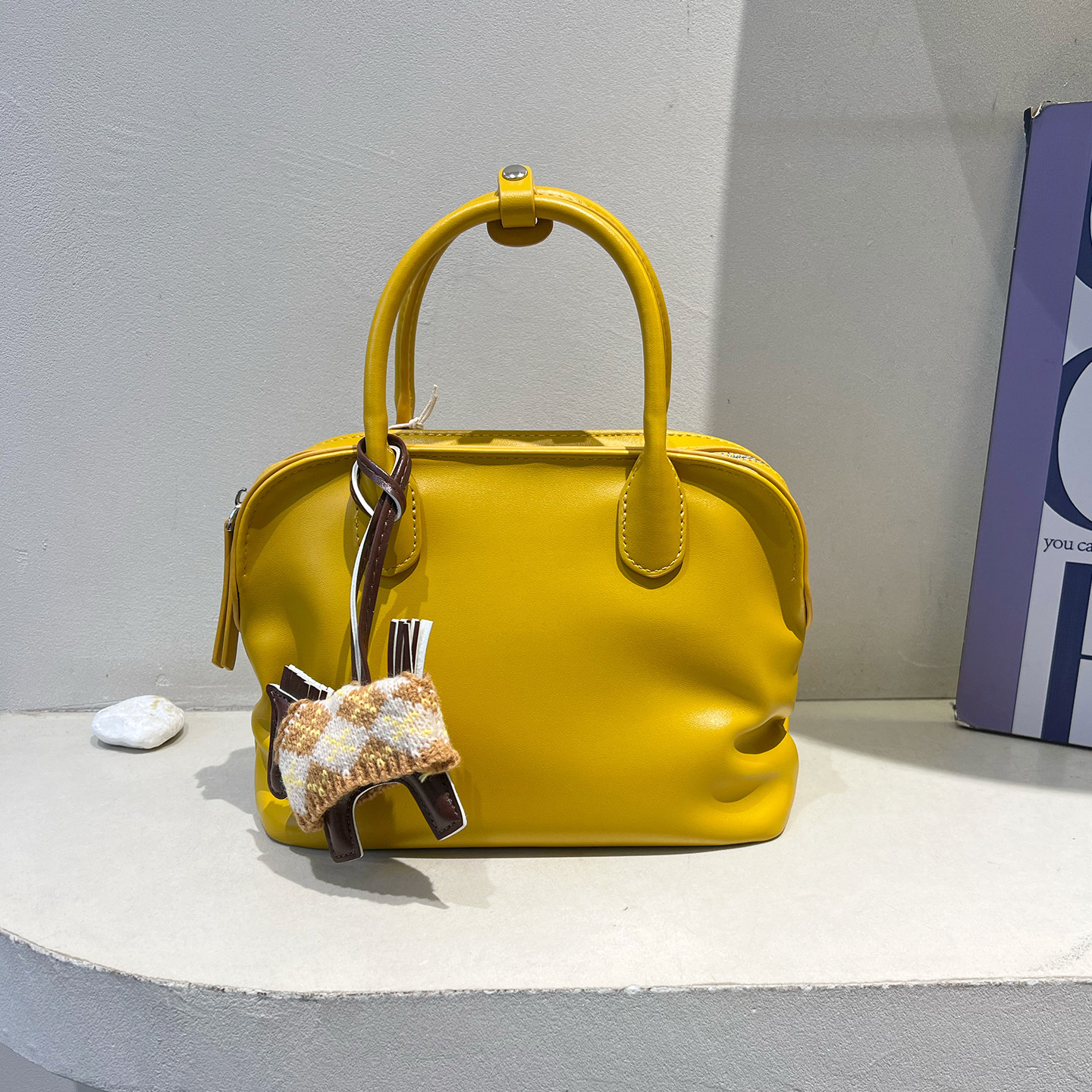 可彼娜韩版简约手提贝壳包褶皱保龄球包女2026早春新款时尚斜挎包