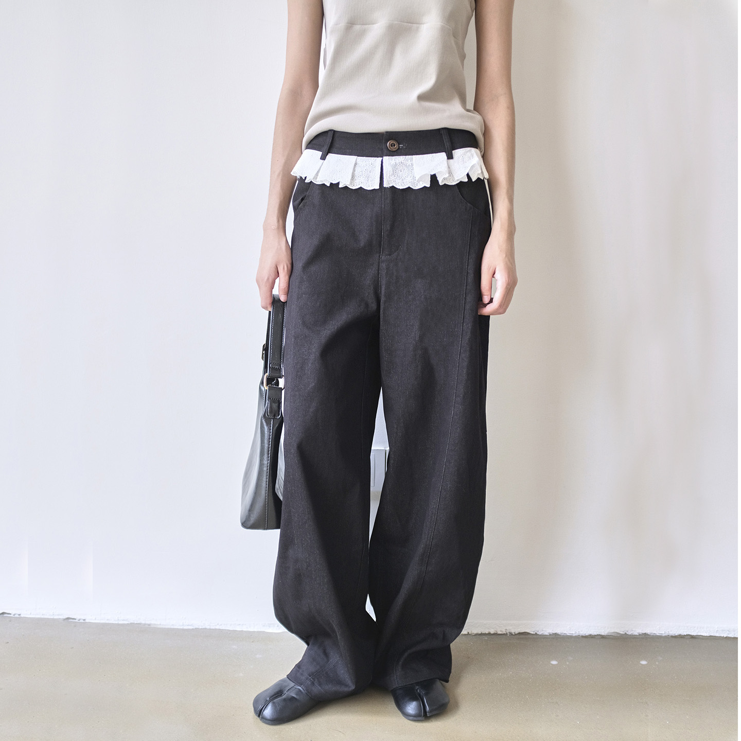 ELEI设计师品牌蕾丝腰边弯刀裤