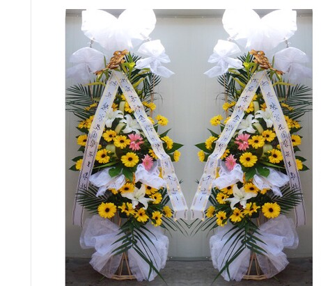 南京六合区龙袍镇南钢凤南创业街鲜花店配送白事花圈花篮同城