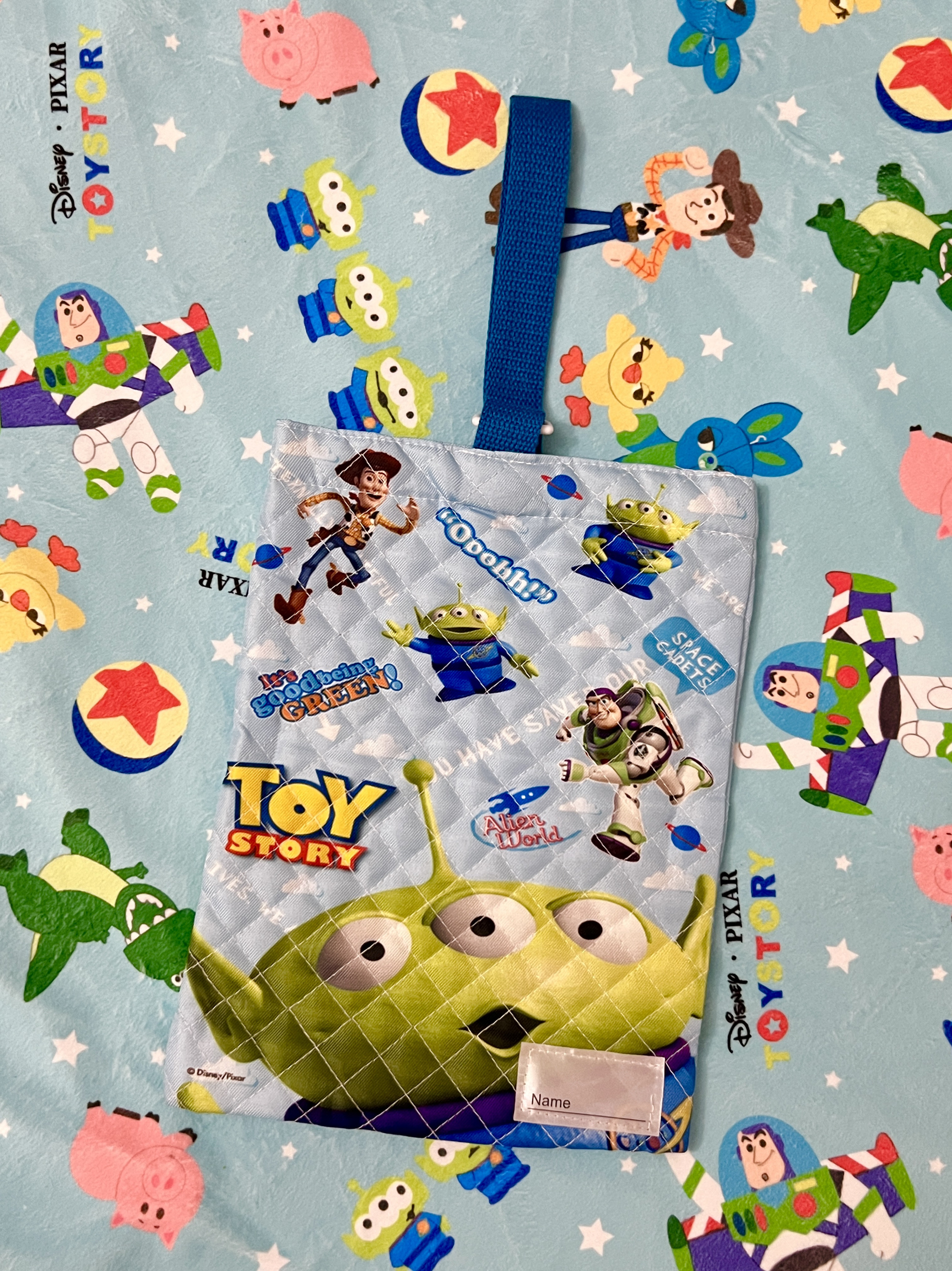 全新现货迪士尼玩具总动员三眼仔菱格便携手拎包收纳袋