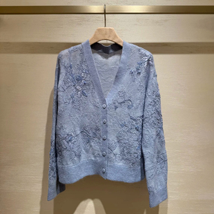 深圳南油高端女装2026春季新款轻奢风蓝色时尚提花设计感针织衫女