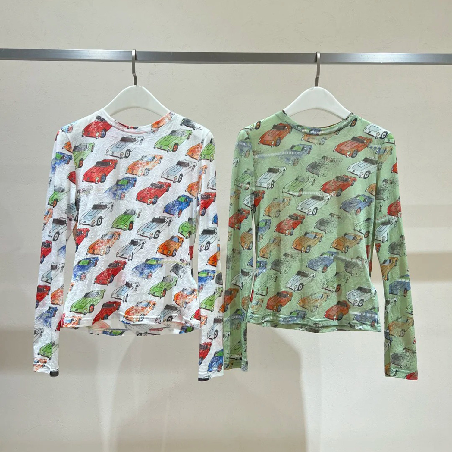 深圳南油高端女装2026春季新款美式童趣风卡通印花时尚修身上衣女