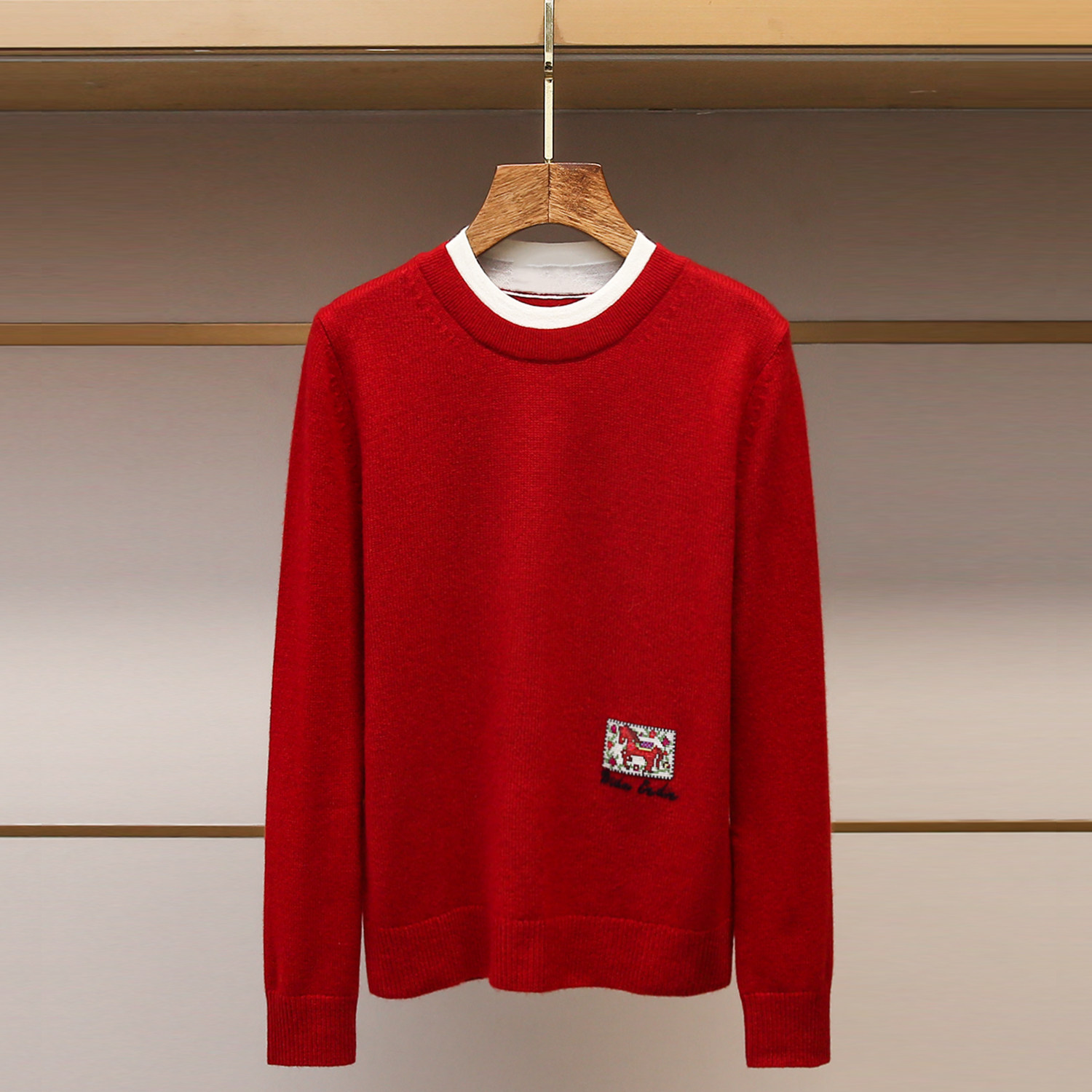 深圳南油高端女装2025冬季新款红色休闲圆领拼色边长袖针织衫上衣