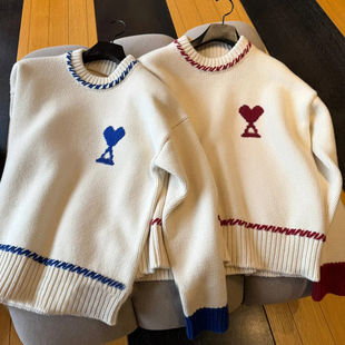 深圳南油高端女装2026春季新款撞色爱心刺绣宽松显瘦百搭针织衫女
