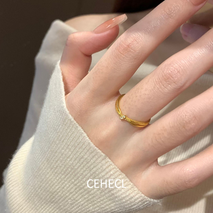 公主心结~金色交叉绳结戒指女款轻奢气质设计感素圈金戒指不掉色