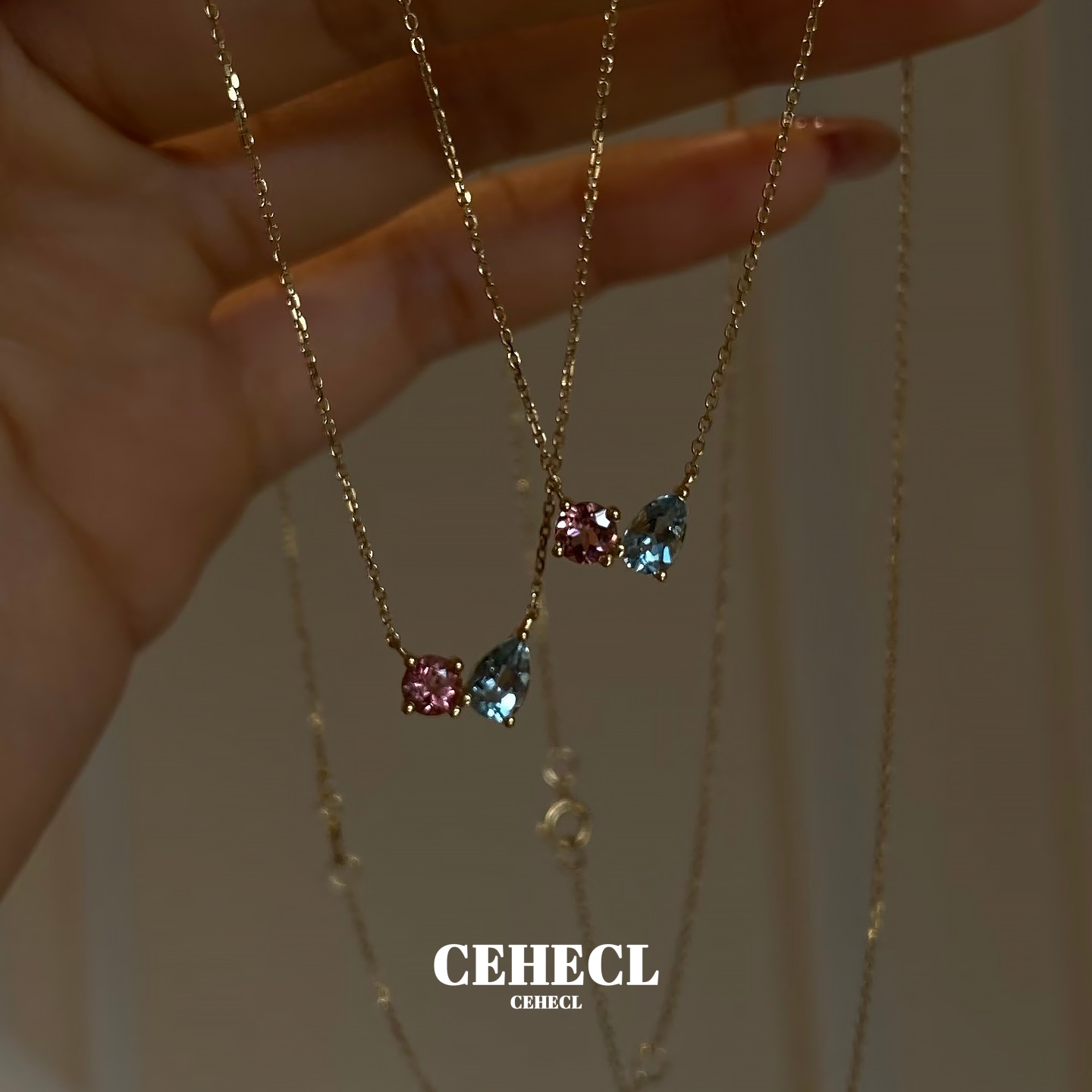 925纯银镀18K金粉蓝锆石吊坠项链