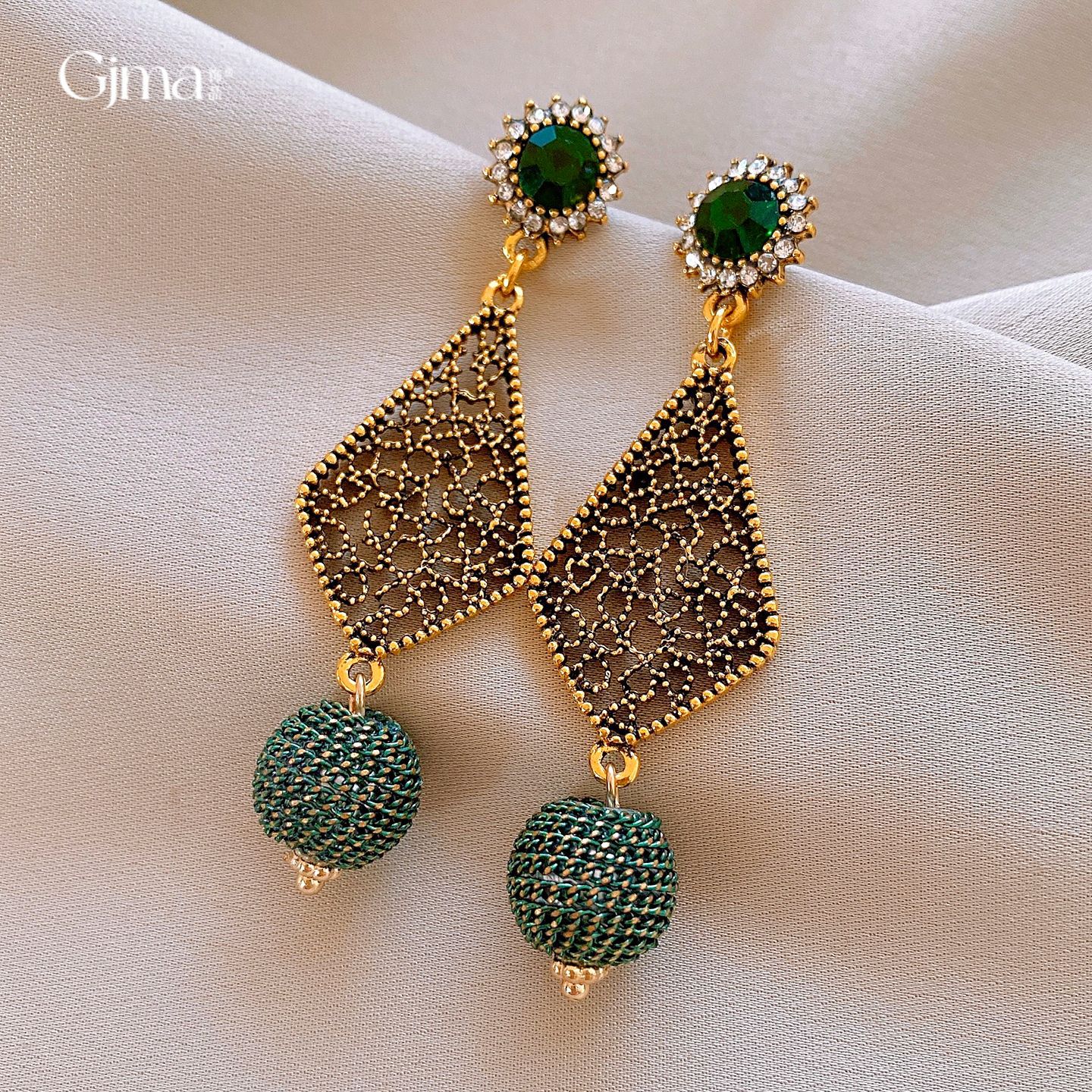 银针复古绿色镶钻菱形镂空耳环