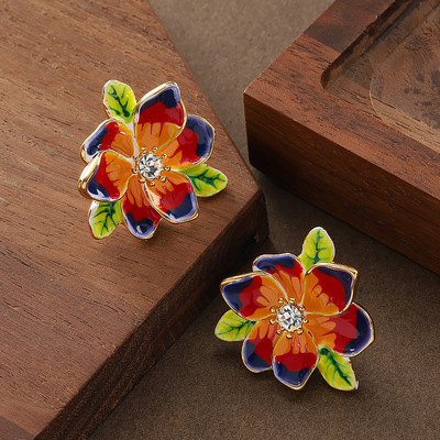 珐琅滴釉镶钻花朵耳钉感银针