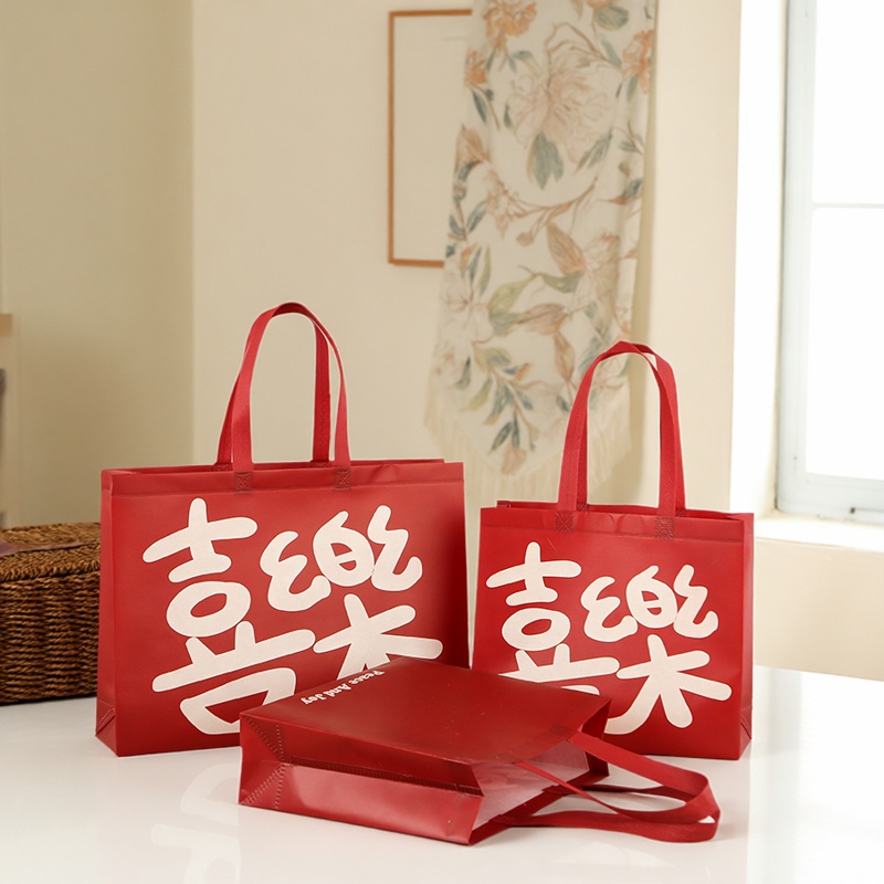 酒红色喜乐礼品袋节日喜庆显眼包购物无纺布服装手提袋子定制logo