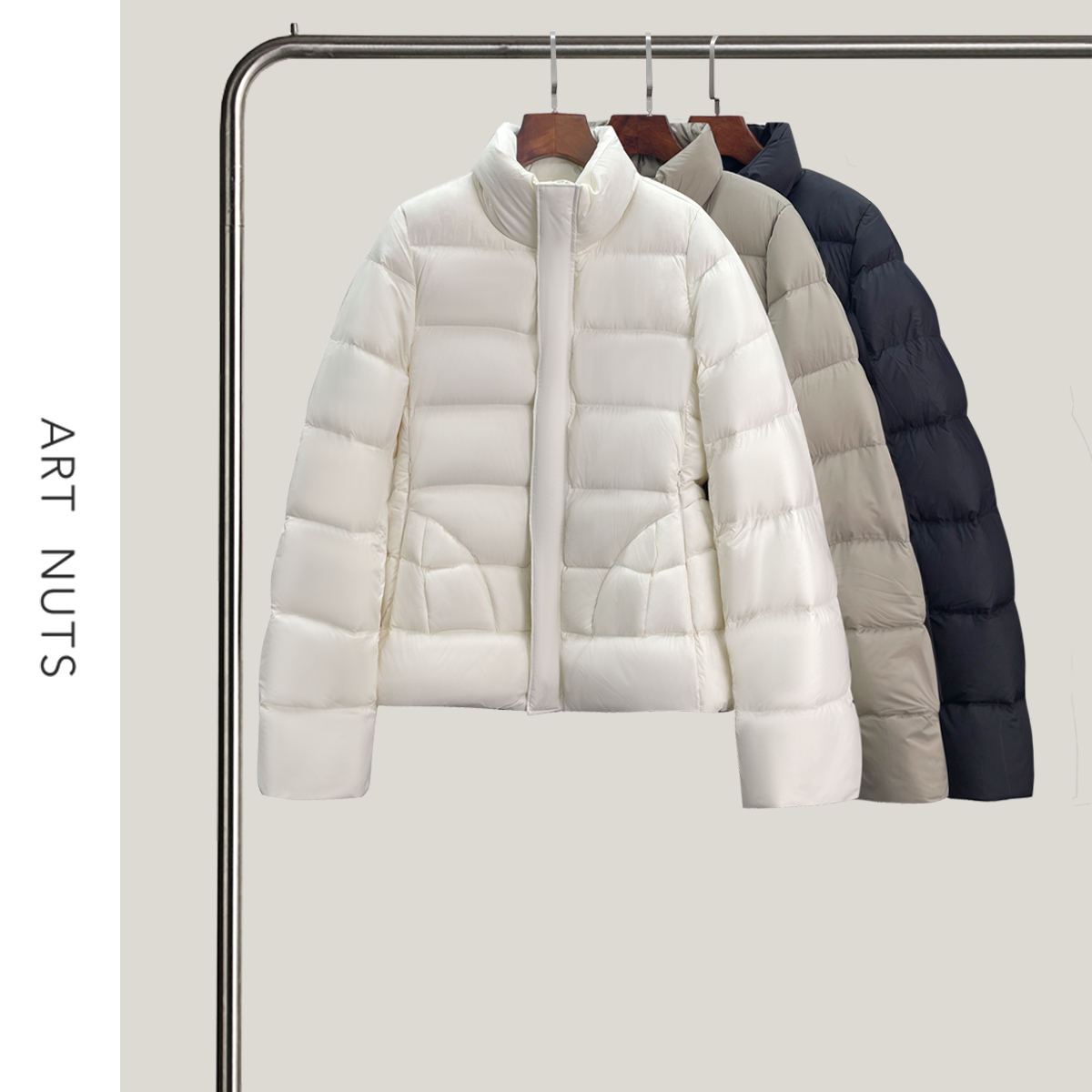 悦迷Art Nuts 简约的线条  秋冬新款立领收腰廓形设计感羽绒外套