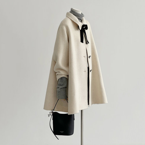 冬新斗篷大衣翻领蝴蝶结毛呢外套